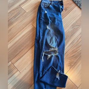 Amazon distressed jeans. Button fly. Size M. Fits like a size 8/10.